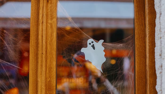 Ghost window sticker with cobwebs in window