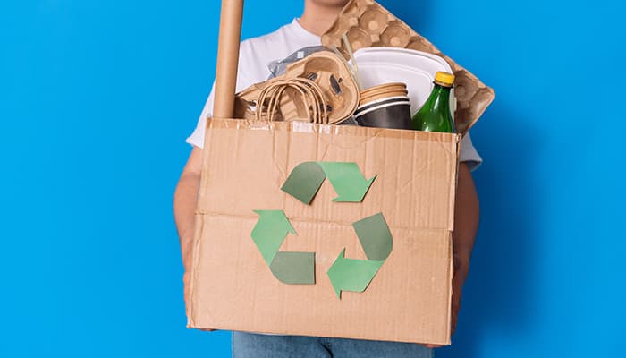 Recycling box full of disposable items