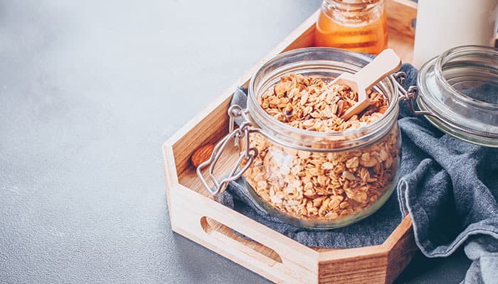 Oats inside a glass jar to help reduce plastic waste