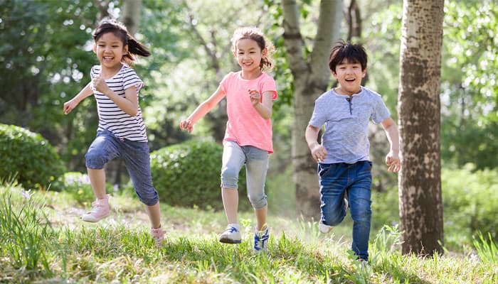 Children taking part in a fun summer scavenger hunt activity